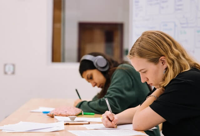 school children writing