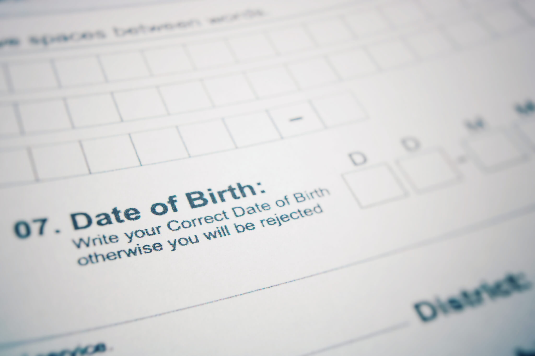 DATE OF BIRTH close up on a printed form