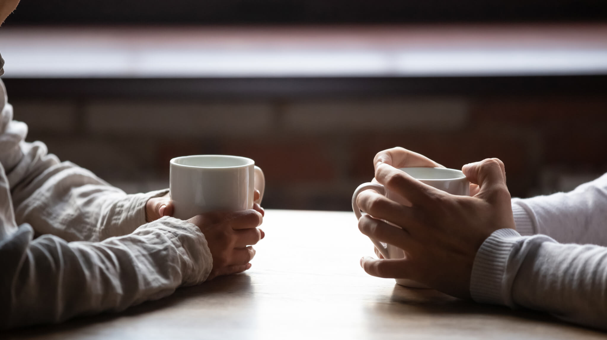 people holding cups