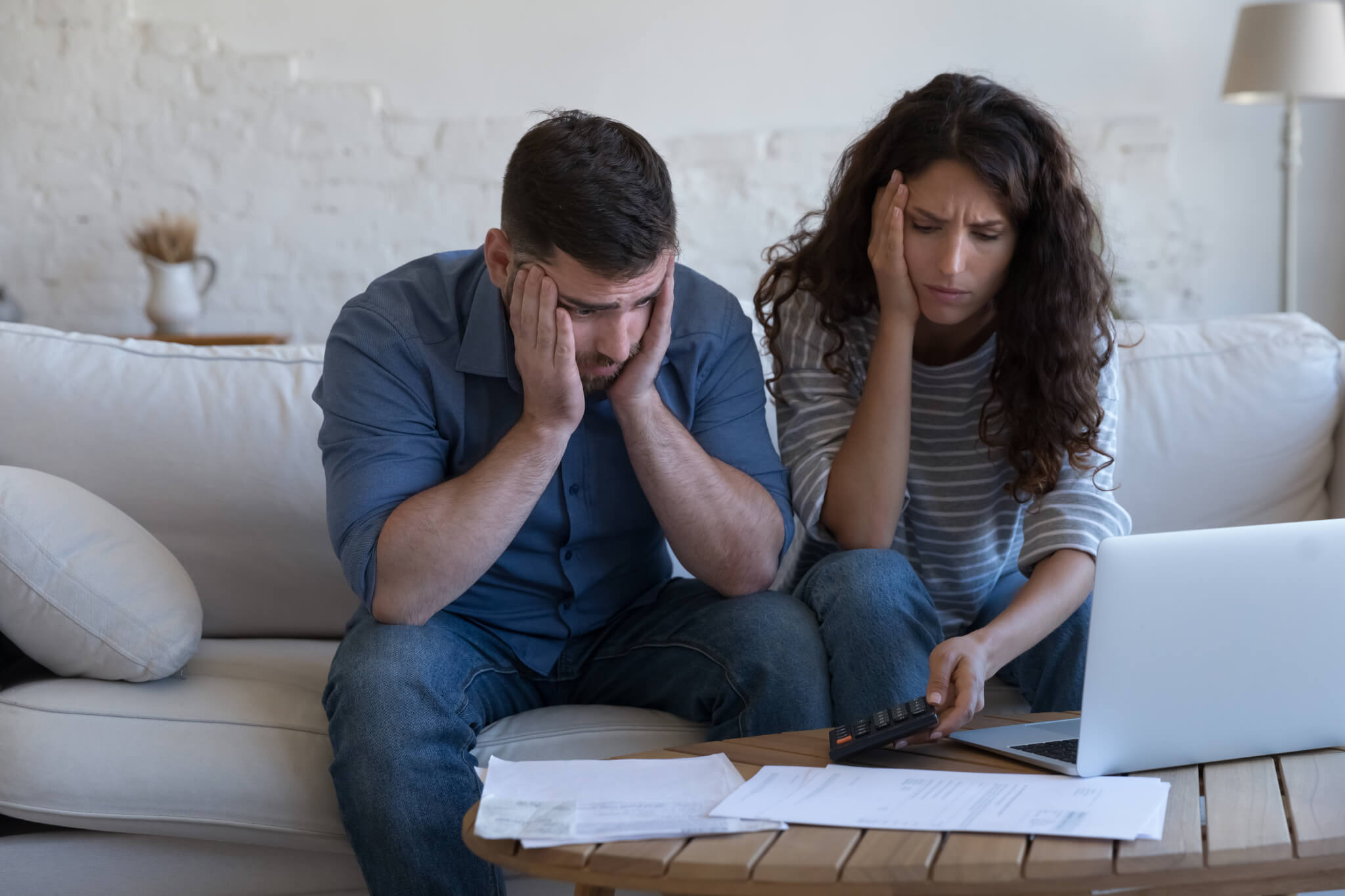 Concerned upset millennial couple