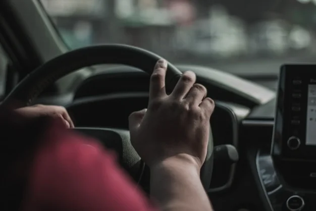 lady driving a car