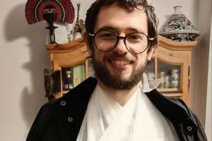 Greg Simmons with his arm in a sling after his cycling accident in Edmonton